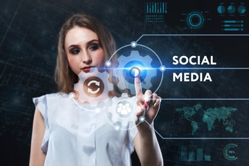 The concept of business, technology, the Internet and the network. A young entrepreneur working on a virtual screen of the future and sees the inscription: Social media