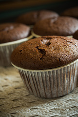 Chocolate muffin on black background