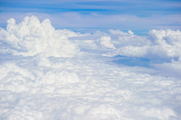 Aerial view on white fluffy clouds
