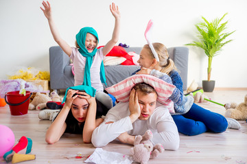 Tired parents and romping kids