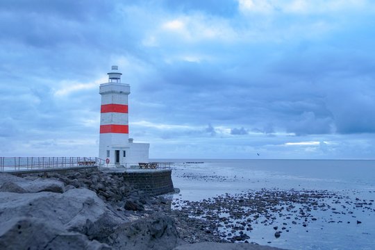 white lighthouse in Gardur iin iceland