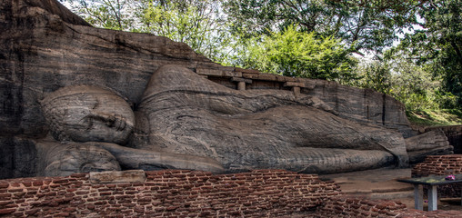 The Ancient and World Renowned Reclining Buddha Statue  showing Peace and tranquility at Gal Vihara in Polonnaruwa, seat of Buddhism in Sri Lanka