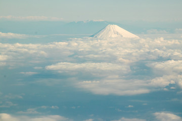 Fuji mountain in Japan with the group of cloud in the aerial view background