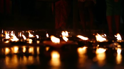 Candle flame close-up in the Indian Temple on a Religious Festival Diwali. Oil Lamp