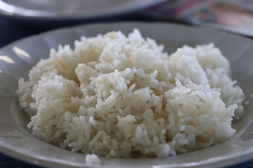 Rice cooked for dinner Asian culture on white plate