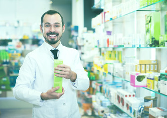 Male pharmacist in pharmacy