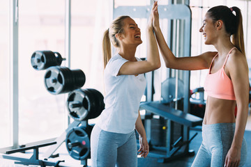 Picture of two fitness women in gym