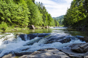 mountain river with waterfall
