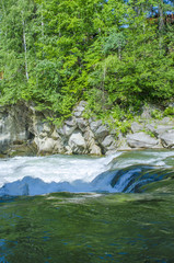 Naklejka na ściany i meble mountain river with waterfall