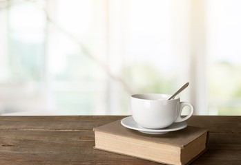 Cup and book.