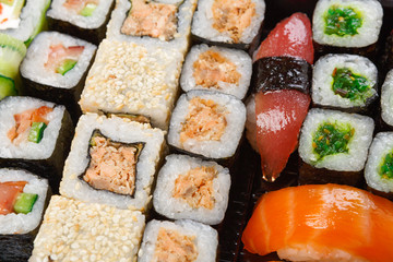Set of sushi, maki and rolls background