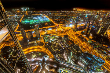 Fototapeta na wymiar Skyscrapers of Dubai at night, UAE
