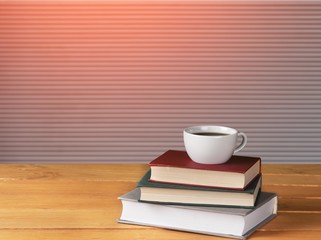 Cup and book.
