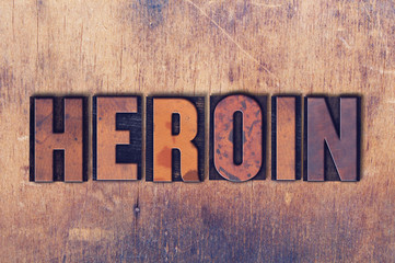 Heroin Theme Letterpress Word on Wood Background