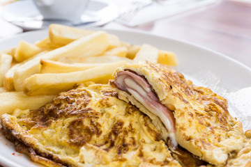 omelet with ham French fries