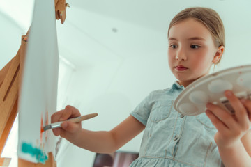 child artist painting