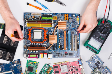 Technician upgrade of computer top view, motherboard