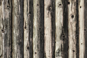 Natural brown log cabin wood wall. Wall texture background pattern.