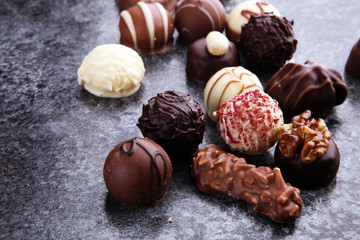 a lot of variety chocolate pralines, belgian confectionery gourmet chocolate