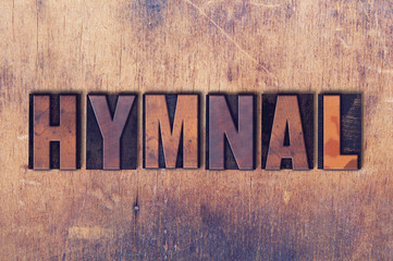 Hymnal Theme Letterpress Word on Wood Background