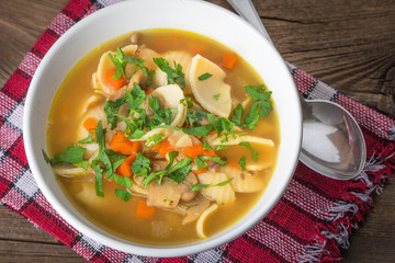 Mushroom soup with parsley.