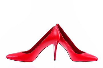 Red high heeled shoes isolated on white background