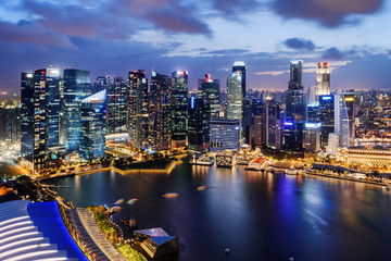 Fototapeta na wymiar Fantastic night view of skyscrapers at downtown of Singapore