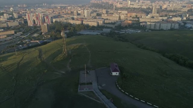 Church of Paraskeva Pyatnitsa is symbol of Krasnoyarsk. City in Siberia, Russia. Russian old architecture. Aerial drone flight around. 4K format