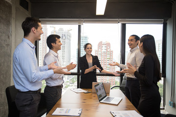 Beautiful businesswoman introduce businessman for work the project with team at meeting room, Business teamwork concept, 20-30 year old.