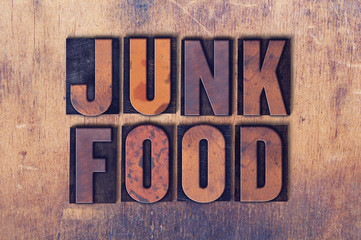 Junk Food Theme Letterpress Word on Wood Background