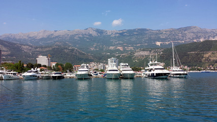 Fototapeta na wymiar Budva, Montenegro - June 27, 2017: Boats, yachts in the beautiful Budva marina