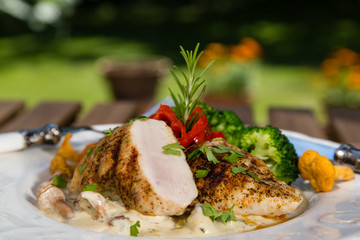 Grilled chicken, cream sauce with mushrooms chanterelles, broccoli and roasted red peppers