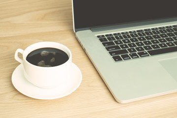 hot black coffee with laptop
