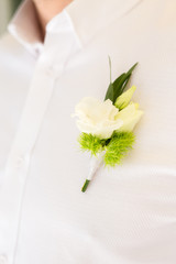 Boutonniere on chest close up.