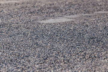 Old black asphalt as background