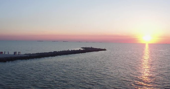 aerial shot sea coast at sunset