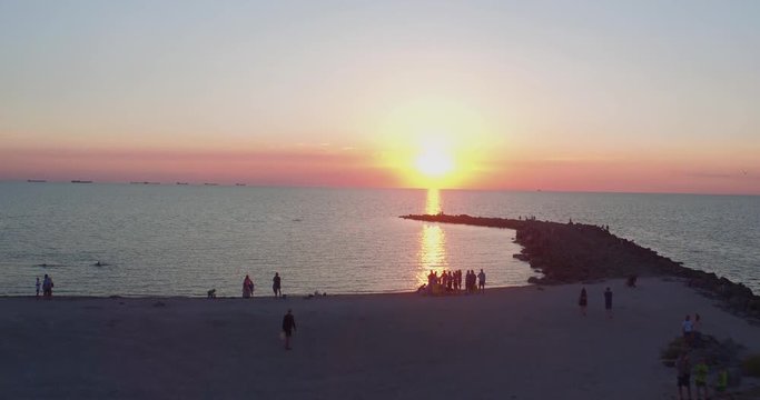 aerial shot sea coast at sunset