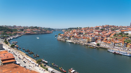 Fototapeta na wymiar Porto, Portugal, panorama of the river Douro and tiles roofs 