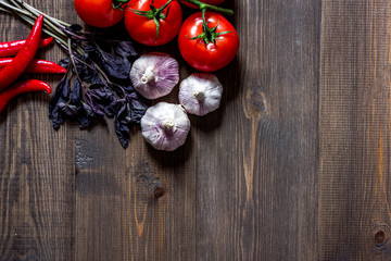 Prepring for cooking dinner. Vegetables on wooden table background top view copyspace