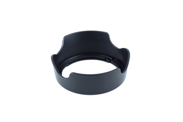 Black plastic camera lens hood for protecting lens, isolated on a white background