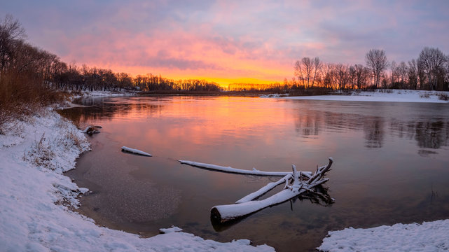 Sunrise at river frosty nowember morning