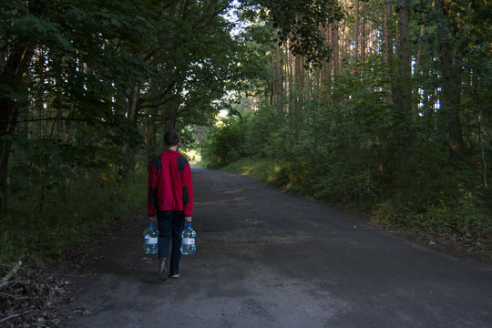 Men walking with water