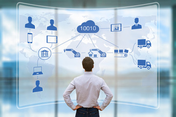 Manager with AR smart factory, industry, automated manufacturing, cloud computing