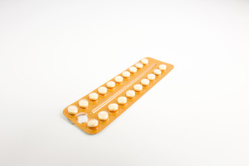 Birth Control Pills With One Missing On White Background