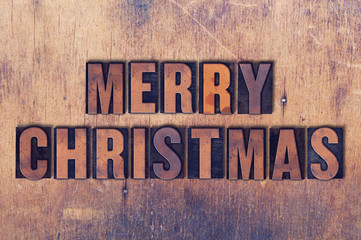 Merry Christmas Theme Letterpress Word on Wood Background