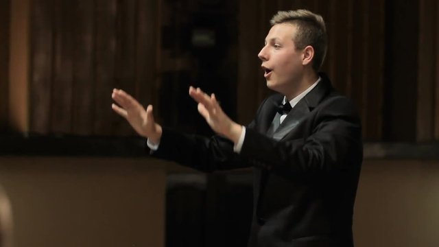 choir conductor during performance