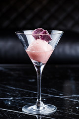 Scoop of the ice cream in martini glass