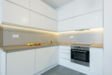 Fototapeta premium Modern kitchen interior design in white color