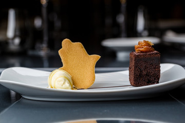 Scoop of the ice cream with brownie and buscuit