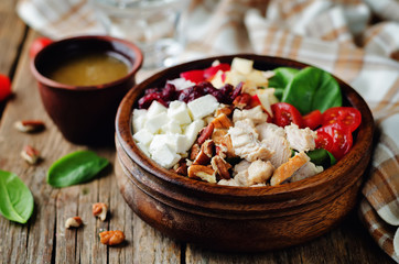 Chicken spinach apple tomato goat cheese salad